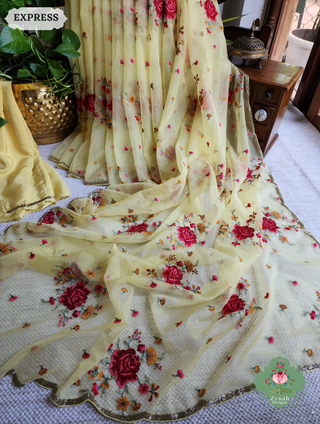 Zynah Yellow Organza Silk Saree Featuring Cross-Stitch Embroidered Roses & Scalloped Border Hand Embellished With Cutdana; Custom Stitched/Ready-made Blouse, Fall, Petticoat; SKU: 1112202401