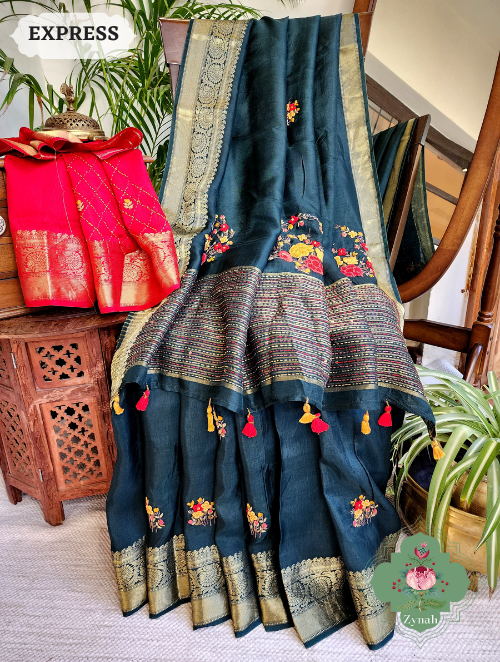 Bottle Green Munga Silk Saree with Zari Borders, Frenchknot & Kantha Embroidery, and elegant embroidered Pallu. 