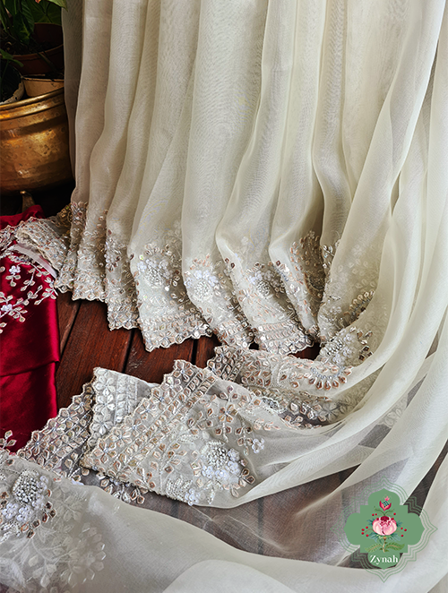 Zynah Cream Colour Pure Organza Silk Saree With Petal Shaped Silver Sequin Work, Pearl Beads & Cutdana Handwork; Custom Stitched/Ready-made Blouse, Fall, Petticoat; SKU: 1001202302