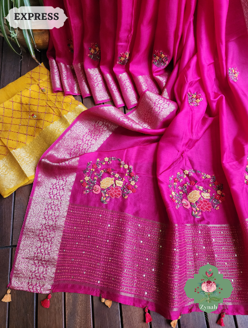 Hot Pink Munga Silk Saree with Zari Borders and Frenchknot & Kantha Embroidery: Traditional elegance with contemporary charm.