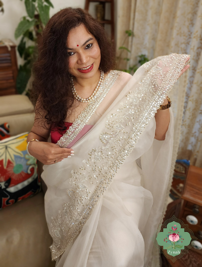 Zynah Cream Colour Pure Organza Silk Saree With Petal Shaped Silver Sequin Work, Pearl Beads & Cutdana Handwork; Custom Stitched/Ready-made Blouse, Fall, Petticoat; SKU: 1001202302