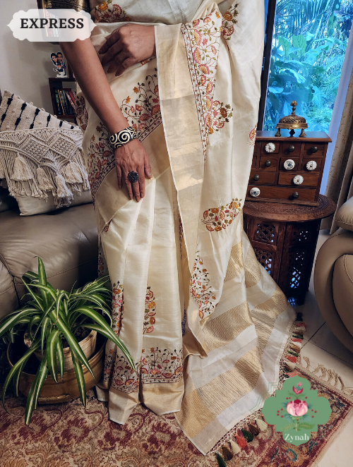 Zynah Off-White Embroidered Tussar Silk Saree, Pichwai Inpired Lotus & Floral Motifs ; Custom Stitched/Ready-made Blouse, Fall, Petticoat; SKU: 1403202302